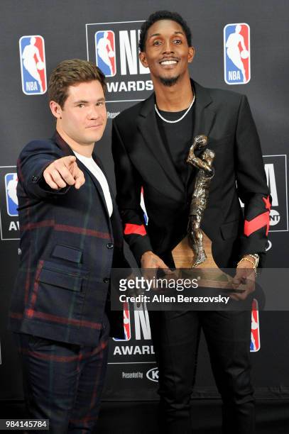 Lou Williams , winner of the 2017-2018 6th Man Award, poses in the backstage photo room with Adam DeVine during the 2018 NBA Awards Show at Barker...