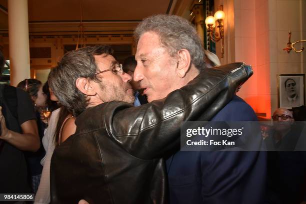 Presenters David Pujadas and Michel Drucker attend "L'Ete Litteraire Des Deux Magots " : Book Signing Cocktail at Les Deux Magots Cafe on June 25,...