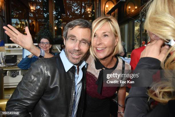 Presenters David Pujadas and Karine Fauvet attend "L'Ete Litteraire Des Deux Magots " : Book Signing Cocktail at Les Deux Magots Cafe on June 25,...