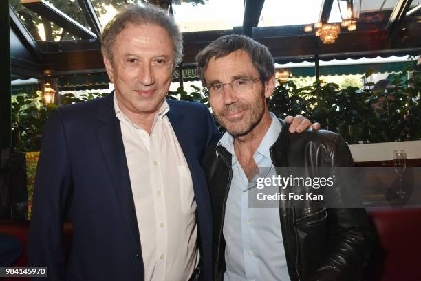 Presenters Michel Drucker and David Pujadas attend "L'Ete Litteraire Des Deux Magots " : Book Signing Cocktail at Les Deux Magots Cafe on June 25,...