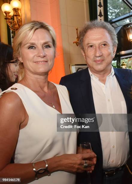 Edith Rebillon and Michel Drucker attend "L'Ete Litteraire Des Deux Magots " : Book Signing Cocktail at Les Deux Magots Cafe on June 25, 2018 in...