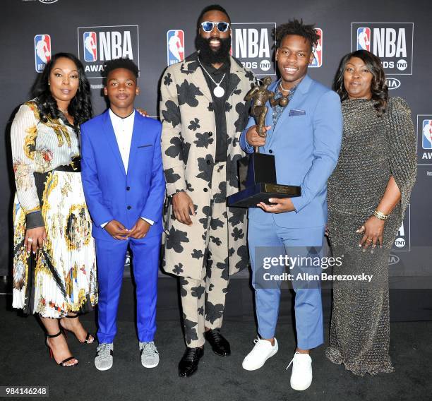 James Harden , winner of the 2017-2018 MVP award, poses with his mom Monja Willis and family in the backstage photo room during the 2018 NBA Awards...