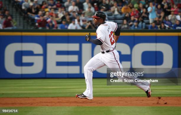 Jason Heyward of the Atlanta Braves rounds the bases against the Chicago Cubs at Turner Field on April 8, 2010 in Atlanta, Georgia. The Cubs defeated...