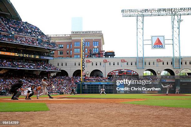 Roy Oswalt of the Houston Astros throws out the first pitch on Opening Day at Minute Maid Park on April 5, 2010 in Houston, Texas. The Giants...