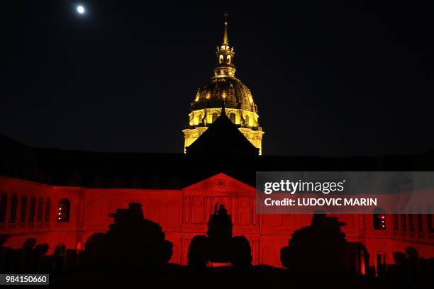 Light projection illuminates the facade of the Hotel des Invalides in Paris during the show "The Rise Of A New World" on June 25, 2018. / RESTRICTED...