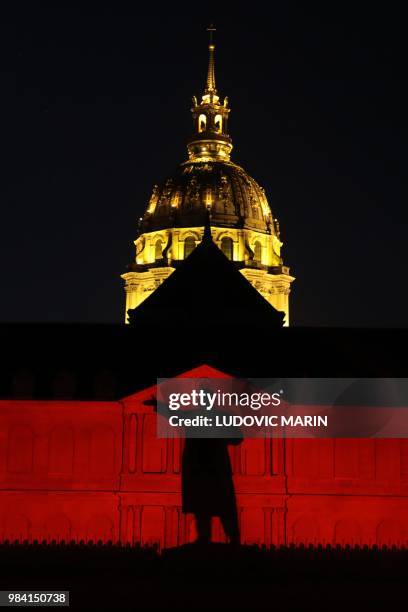 Light projection illuminates the facade of the Hotel des Invalides in Paris during the show "The Rise Of A New World" on June 25, 2018. / RESTRICTED...