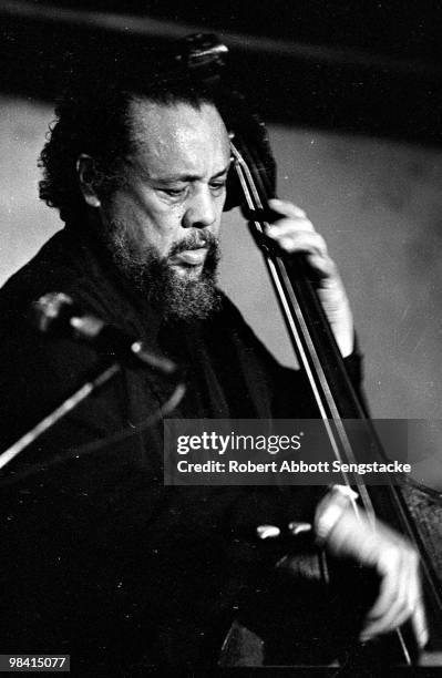 Close-up of jazz great Charles Mingus performs in an unidentified Pittsburgh venue, 1974.