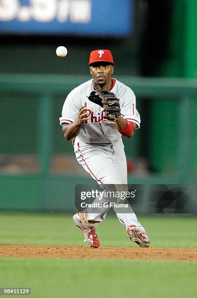 Jimmy Rollins of the Philadelphia Phillies fields the ball during the game against the Washington Nationals at Nationals Park on April 7, 2010 in...