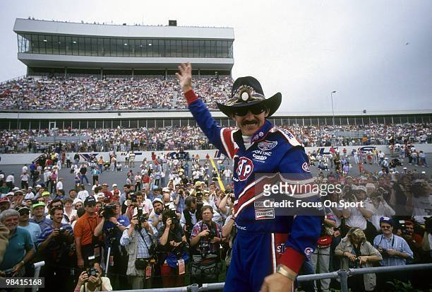 Nascar driver Richard Petty in this portrait waves to the fans and media February 16, 1992 before the Nascar Winston Cup Daytona 500 race at Daytona...