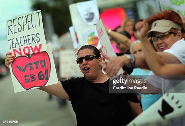 Alina Diaz a first gradel teacher and others gather to protest the passing of the bill named SB 6 by the Florida legislator on April 12, 2010 in...