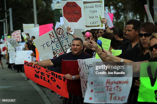 Teachers and their supporters gather to protest the passing of the bill named SB 6 by the Florida legislator on April 12, 2010 in Miami, Florida. The...