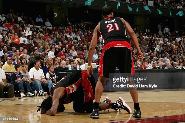 Chris Bosh of the Toronto Raptors lays on the court after getting hit in the face during the game against the Cleveland Cavaliers on April 6, 2010 at...