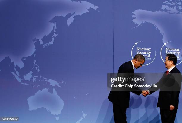 President Barack Obama welcomes Chinese President Hu Jintao to the Nuclear Security Summit at the Washington Convention Center April 12, 2010 in...