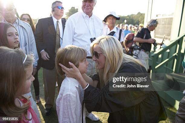 Amy Mickelson, wife of Phil Mickelson, with son Evan during Sunday play at Augusta National. Augusta, GA 4/11/2010 CREDIT: John Biever