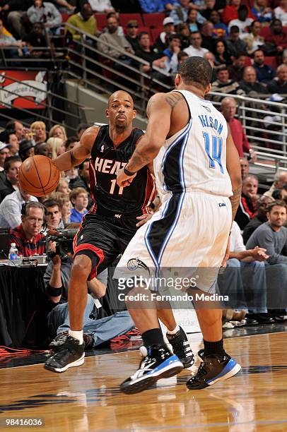 Rafer Alston of the Miami Heat moves the ball against Jameer Nelson of the Orlando Magic during the game on February 28, 2010 at Amway Arena in...