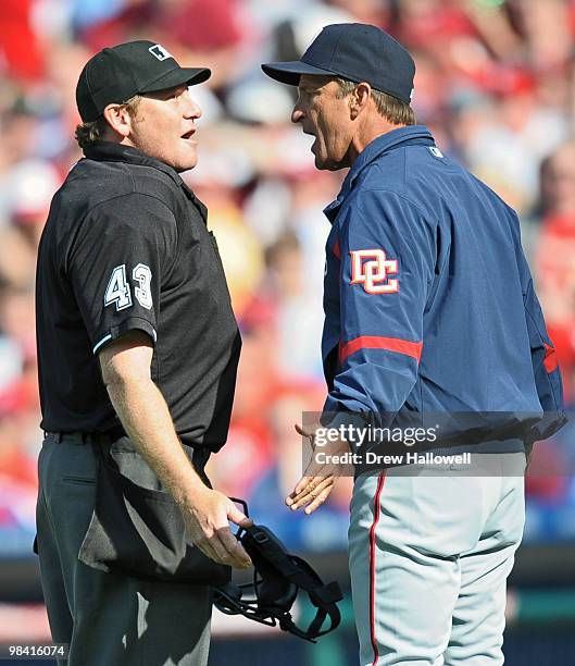 Manager Jim Riggleman of the Washington Nationals argues with home plate umpire Paul Schrieber after getting ejected during the game against the...