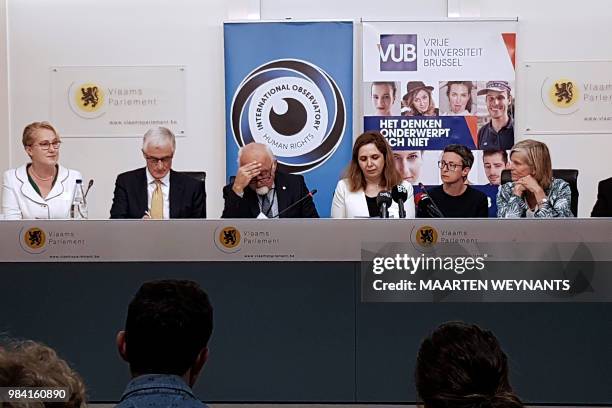 Flemish Minister-President Geert Bourgeois, Flemish Parliament chairman Jan Peumans, Vida Mehrannia the wife of Djalali, an interpreter and VUB...