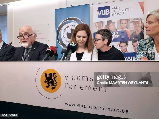 Flemish Parliament chairman Jan Peumans, Vida Mehrannia the wife of Djalali, an interpreter and VUB rector Caroline Pauwels hold a press conference...