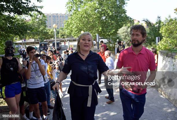 Ines Madrigal , a railway worker who heads the Murcia branch of SOS Stolen Babies association, arrives at a provincial court in Madrid, on June 26,...