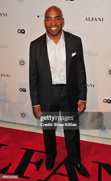 Former NY Giants running back Tiki Barber attends the GQ and ALFANI RED Night of Glamour and Giving at the Stephen Weiss Studio on October 5, 2009 in...