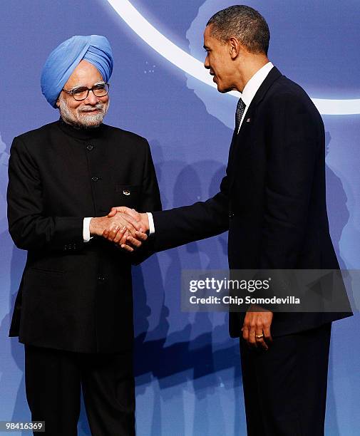 President Barack Obama welcomes Indian Prime Minister Manmohan Singh at the start of the Nuclear Security Summit at the Washington Convention Center...