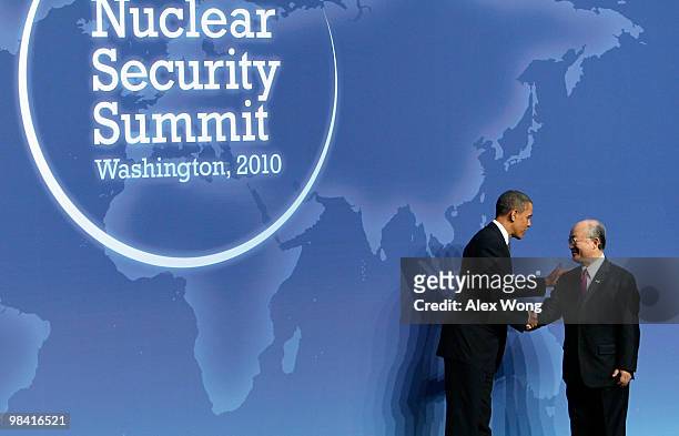President Barack Obama shakes hand with Director General of the International Atomic Energy Agency Yukiya Amano at the Nuclear Security Summit April...