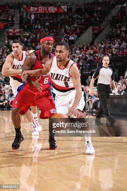 Patrick Mills of the Portland Trail Blazers drives the ball against Bobby Brown of the Los Angeles Clippers on February 16, 2010 at the Rose Garden...