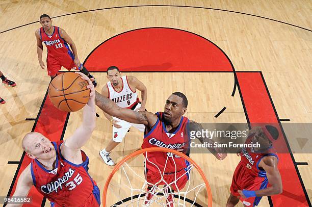 Chris Kaman of the Los Angeles Clippers makes a rebound against the Portland Trail Blazers on February 16, 2010 at the Rose Garden Arena in Portland,...