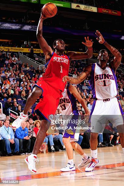 Samuel Dalembert of the Philadelphia 76ers goes up for a shot over Amar'e Stoudemire of the Phoenix Suns during the game on February 24, 2010 at US...