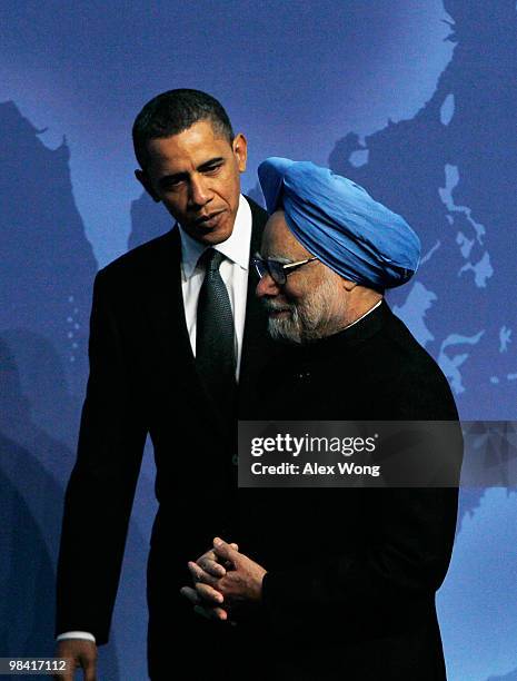 President Barack Obama talks to Prime Minister of the Republic of India Manmohan Singh at the Nuclear Security Summit April 12, 2010 in Washington,...