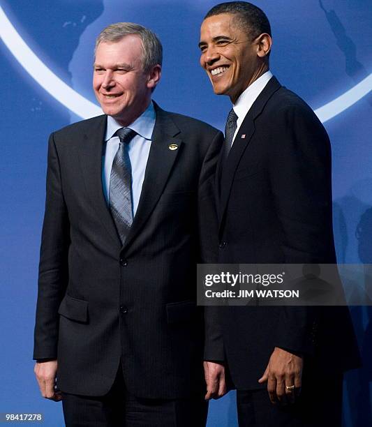 President Barack Obama greets the Prime Minister of Belgium Yves Leterme upon his arrival for dinner during the Nuclear Security Summit at the...