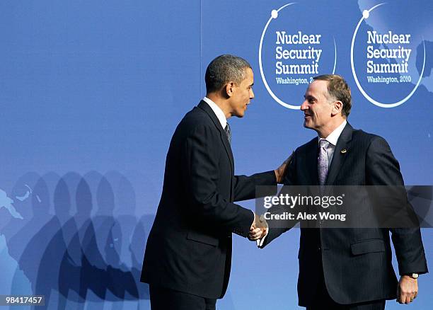 President Barack Obama shakes hand with Prime Minister of New Zealand John Key at the Nuclear Security Summit April 12, 2010 in Washington, DC....