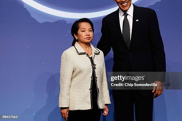 President Barack Obama and Philippines President Gloria Macapagal-Arroyo pose for photographs at the start of the Nuclear Security Summit at the...