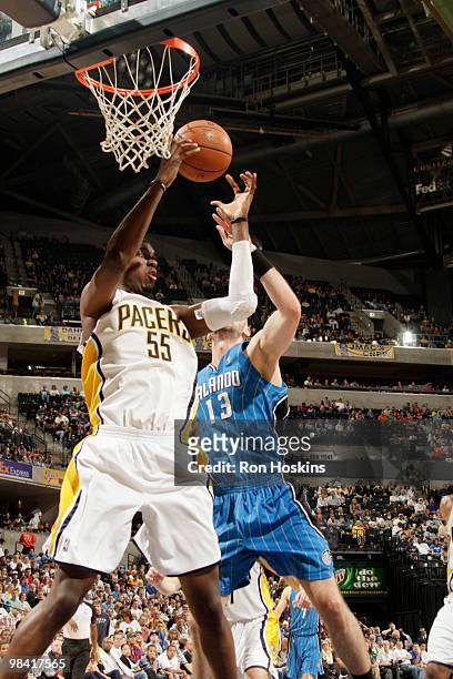 Roy Hibbert of the Indiana Pacers battles Marcin Gortat of the Orlando Magic at Conseco Fieldhouse on April 12, 2010 in Indianapolis, Indiana. NOTE...