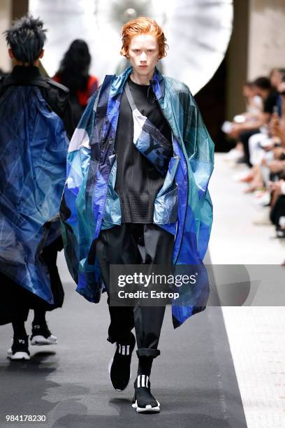 Model walks the runway during the Y-3 Menswear Spring/Summer 2019 show as part of Paris Fashion Week on June 24, 2018 in Paris, France.