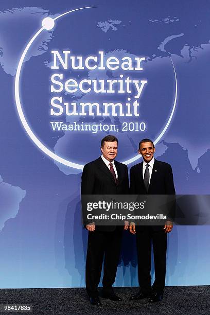 President Barack Obama and Ukrainian President Viktor Yanukovych pose for photographs at the start of the Nuclear Security Summit at the Washington...