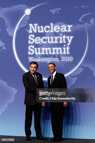 President Barack Obama and Georgian President Mikheil Saakashvili pose for photographs at the start of the Nuclear Security Summit at the Washington...