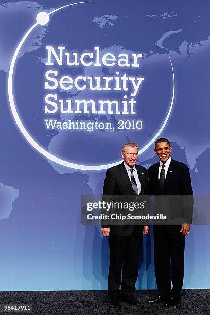 President Barack Obama and Belgian Prime Minister Yves Leterme pose for photographs at the start of the Nuclear Security Summit at the Washington...