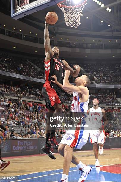 Amir Johnson of the Toronto Raptors goes up for a dunk over Tayshaun Prince of the Detroit Pistons in a game at the Palace of Auburn Hills on April...