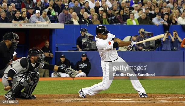 Vernon Wells of the Toronto Blue Jays hits a 2 run home run in the bottom of the 3rd inning against the Chicago White Sox during their MLB game at...