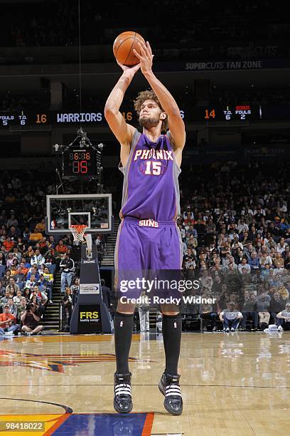Robin Lopez of the Phoenix Suns shoots a jump shot during the game against the Golden State Warriors at Oracle Arena on March 22, 2010 in Oakland,...