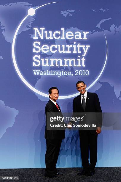 President Barack Obama and Prime Minister of Vietnam Nguyen Tan Dung pose for photographs at the start of the Nuclear Security Summit at the...