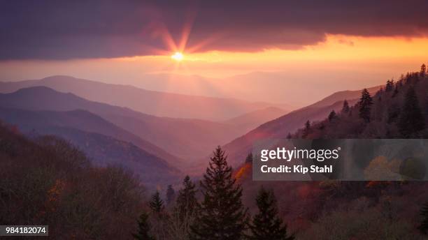 a mountainous landscape during sunset at smoky mountain national park in tennessee, usa. - gatlinburg stock pictures, royalty-free photos & images