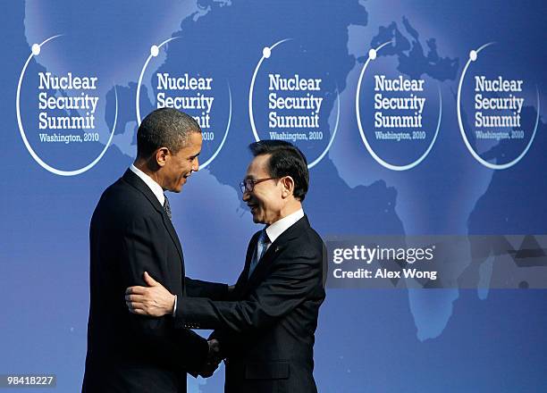 President Barack Obama greets South Korean President Lee Myung-bak at the Nuclear Security Summit April 12, 2010 in Washington, DC. President Obama...