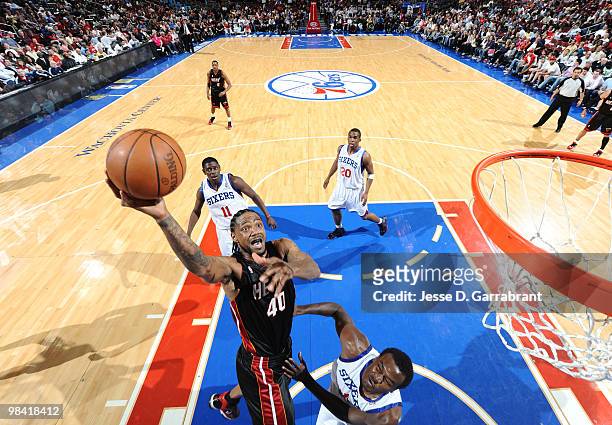 Udonis Haslem of the Miami Heat shoots against Samuel Dalembert of the Philadelphia 76ers during the game on April 12, 2010 at the Wachovia Center in...