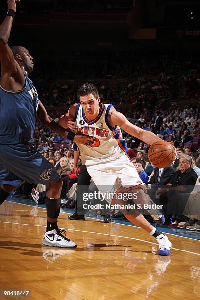 Danilo Gallinari of the New York Knicks drives against Andray Blatche of the Washington Wizards on April 12, 2010 at Madison Square Garden in New...