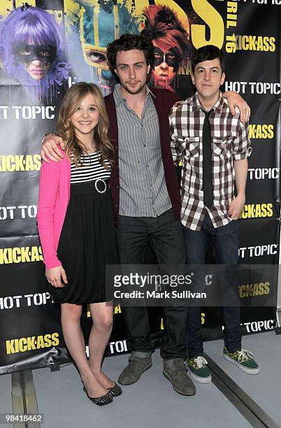 Actors Chloe Moretz, Aaron Johnson and Christopher Mintz-Plasse attend the "Kick-Ass" cast meet and greet at Hot Topic on April 12, 2010 in...