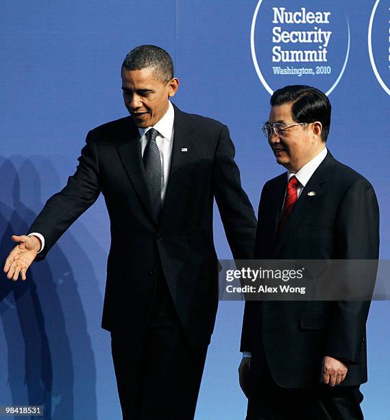 President Barack Obama shows the way to President of China Hu Jintao at the Nuclear Security Summit April 12, 2010 in Washington, DC. President Obama...