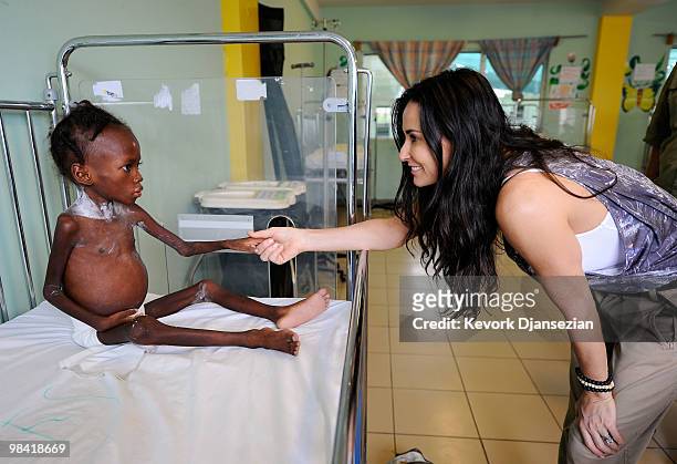Demi Moore and Susan Sarandon visit the pedeatric malnutrition ward of St. Damien�s children's hospital on April 12, 2010 in Port-au-Prince, Haiti....