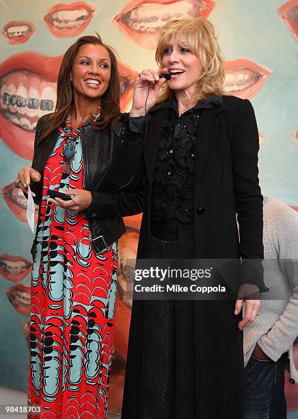 Actresses Vanessa Williams and Judith Light speak at an "Ugly Betty" charity auction benefiting Save the Children at Axelle Fine Arts Gallery Ltd on...